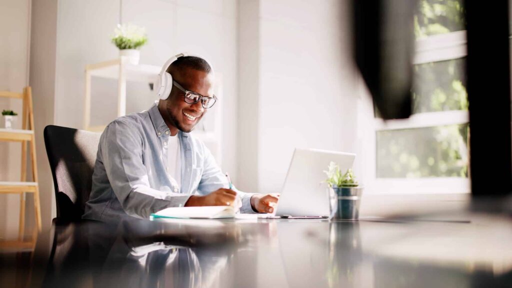 Man Listening In On Webinar